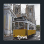 Yellow tram on Lisbon Cathedral in Portugal<br><div class="desc">Traditional yellow tram in front of Lisbon Cathedral in Lisbon,  Portugal</div>