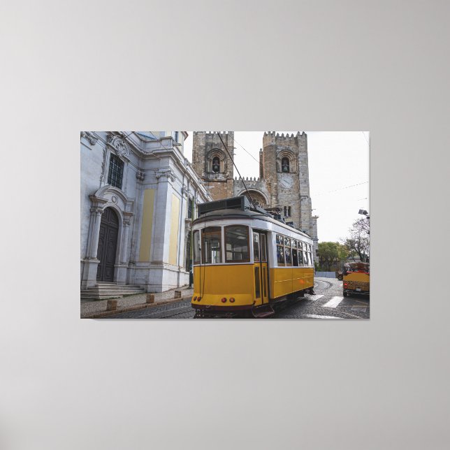 Yellow tram on Lisbon Cathedral in Portugal Canvas Print (Front)