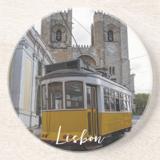 Yellow tram on Lisbon Cathedral in Portugal Coaster