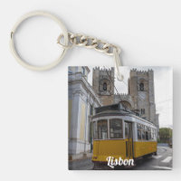 Yellow tram on Lisbon Cathedral in Portugal
