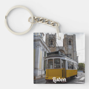 Yellow tram on Lisbon Cathedral in Portugal Keychain