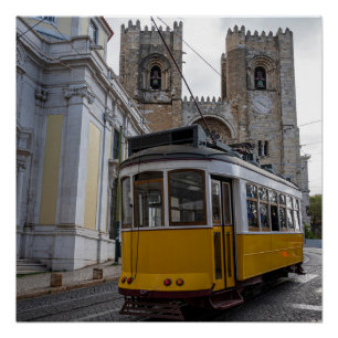Yellow tram on Lisbon Cathedral in Portugal Poster