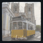 Yellow tram on Lisbon Cathedral in Portugal Stone Coaster<br><div class="desc">Traditional yellow tram in front of Lisbon Cathedral in Lisbon, Portugal.</div>