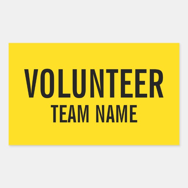Yellow Volunteer Badge with Custom Team Name Sticker (Front)