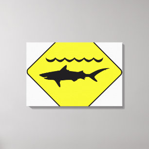Yellow 'warning sharks' sign canvas print