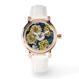 Yellow, white and bi-colour roses with blue leaves watch