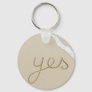Yes carved word on the beach sand keychain