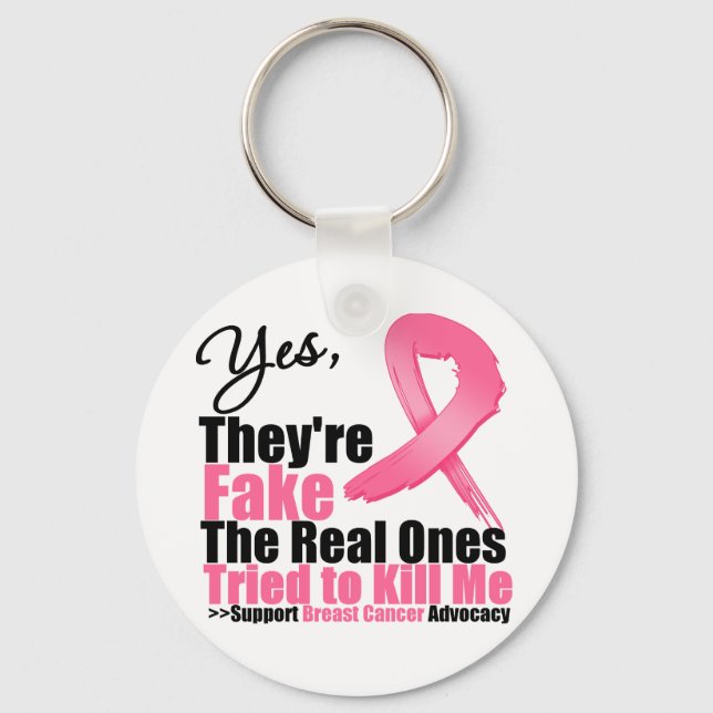 YES They're fake....My real ones tried to kill me Keychain (Front)