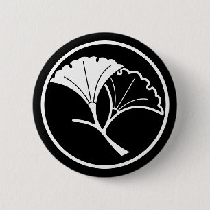 Yin and yang ginkgo leaves in threadlike ring 2 inch round button
