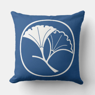 Yin and yang ginkgo leaves in threadlike ring throw pillow