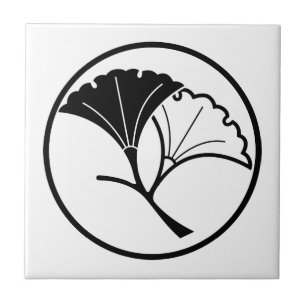 Yin and yang ginkgo leaves in threadlike ring tile