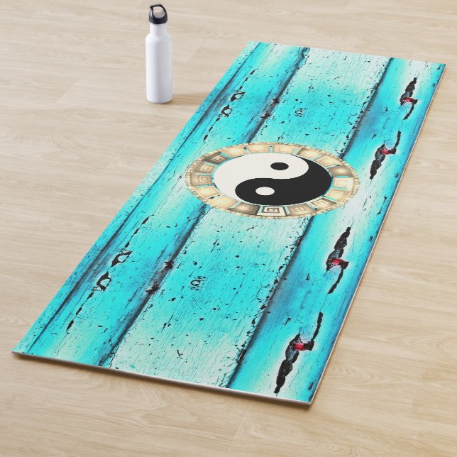 Yin yang on chipped paint yoga mat (In Situ)