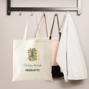 Yoga pose swirls green orange name slogan retro tote bag