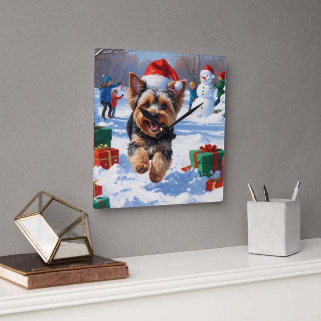 Yorkipoo Running in Snow with Christmas Hat Square Wall Clock (Office)