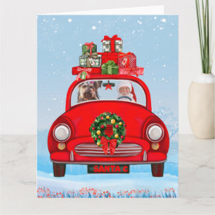 Yorkshire Terrier Dog In Car With Santa Claus Card