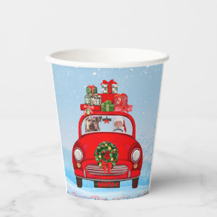Yorkshire Terrier Dog In Car With Santa Claus Paper Cups