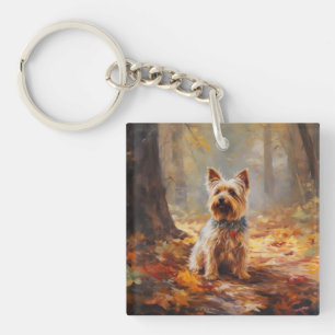 Yorkshire Terrier en automne feuilles tombées insp