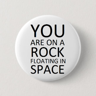 You are on a rock floating in space 2 inch round button