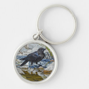 Young Black Raven Reflected in Pool Keychain