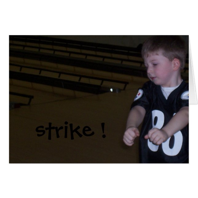 YOUNG BOY BOWLING......STRIKE (Front Horizontal)