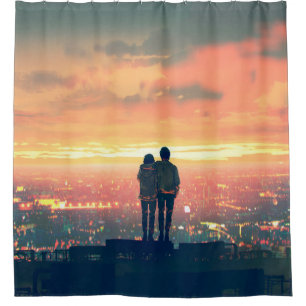 young couple standing on the roof top looking at c
