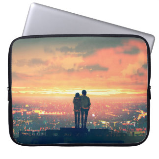 young couple standing on the roof top looking at c laptop sleeve