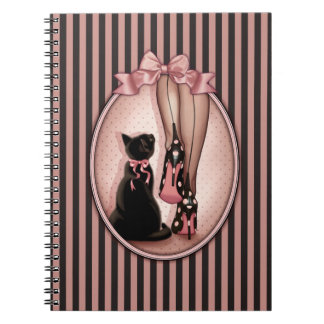 Young, elegant woman and black cat notebook