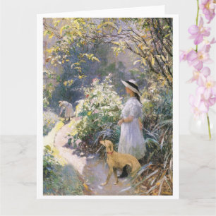 Young girl and her greyhound in the garden card