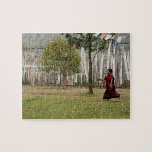 Young monk and prayer flags jigsaw puzzle