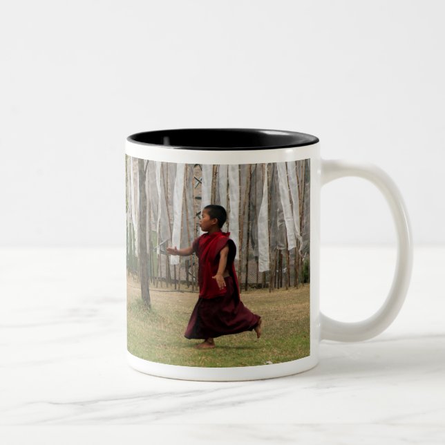 Young monk and prayer flags Two-Tone coffee mug (Right)