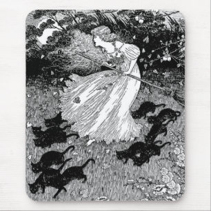 Young witch and black cats mouse pad