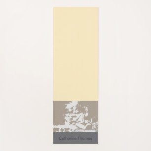  young woman  in a yoga pose mat