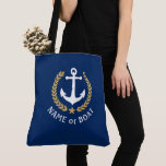 Your Boat Name Anchor Gold Laurel Large Navy Blue Tote Bag<br><div class="desc">A nautical themed tote bag with your personalized name, boat name or other desired text. Features a custom designed nautical boat anchor with gold style laurel leaves and star on navy blue. Easily customize the base colour to match your current decor or theme. Reusable and great for vacation, shopping and...</div>