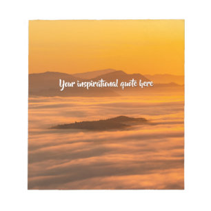 Your custom text sunrise above foggy landscape notepad