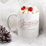 Your Family Christmas Modern Script Family Name Coffee Mug<br><div class="desc">Modern,  minimalist Christmas calligraphy design with your family name! Simple yet classic stylish in red and green,  this cute mug makes for festive family flair! Rock the holidays in our personalized mugs with modern script. Unwrap the joy! 🎄👨‍👩‍👧‍👦 #ChristmasStyle #FamilyLove #FestiveFamily</div>
