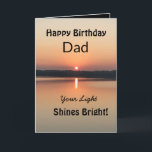 Your Light Shines Bright Dad Birthday Card<br><div class="desc">Give your Dad an amazing sunset birthday card with the verse “your light shines bright”. The design is bold and modern with vibrant black and gold colors showing an inspirational view of a peaceful lake.</div>