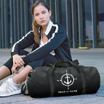 Your Name or Boat Stylish Nautical Compass Anchor  Duffle Bag<br><div class="desc">A nautical themed travel duffle bag with your personalized name, boat name, favourite sailing location or other desired text. This stylish design features a custom boat anchor and compass in white highlighted by the bags rich black colour. You can easily edit the design and change the bag colours to any...</div>