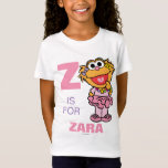 Z is for Zoe | Add Your Name T-Shirt<br><div class="desc">Celebrate Sesame Street fun with this personalized t-shirt featuring Zoe and the letter "Z." Accented with vibrant colours and playful details, this design allows you to add your name, making it a unique and cheerful addition to your wardrobe. Perfect for fans of Zoe and Sesame Street of all ages.</div>