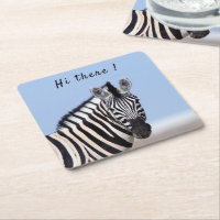 Zebra looking at you with blue sky photo text