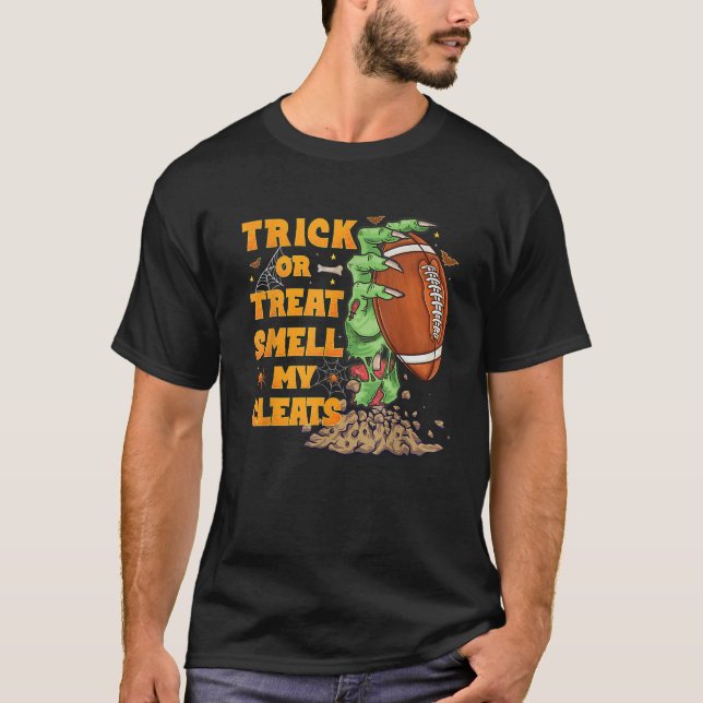 Zombie Hands Holding Football Funny Scary Hallowee T-Shirt (Front)